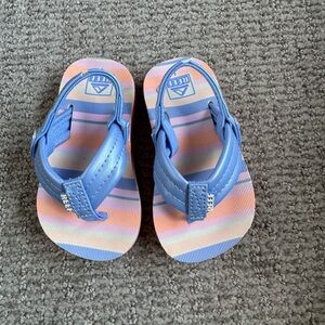 Reef Kids Ahi flip flops in Blue and Pink Stripes